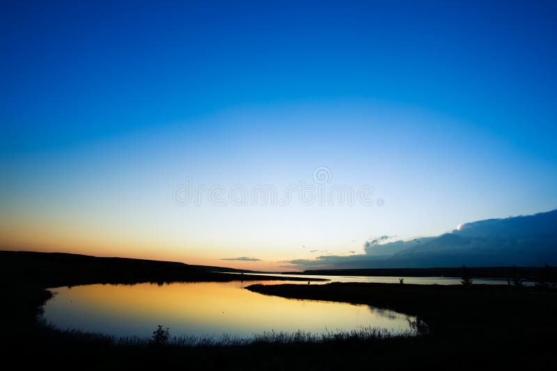Puesta del sol del lago foto de archivo libre de regalías Puesta del sol del lago foto de archivo libre de regalías