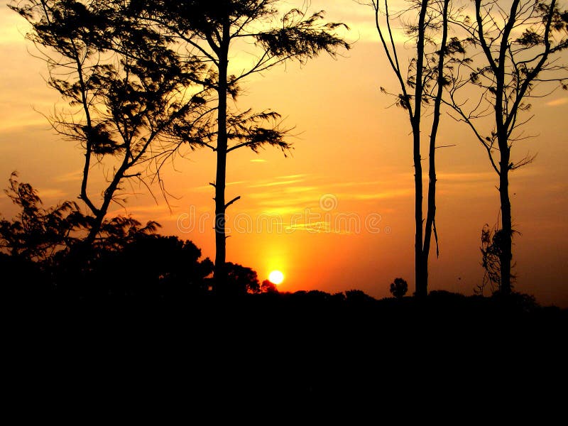 Puesta del sol en Mahabalipuram fotografía de archivo Puesta del sol en Mahabalipuram fotografía de archivo