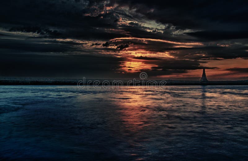 Bold, cinematic, dark and magical sunset over the sea. Bold, cinematic, dark and magical sunset over the sea.