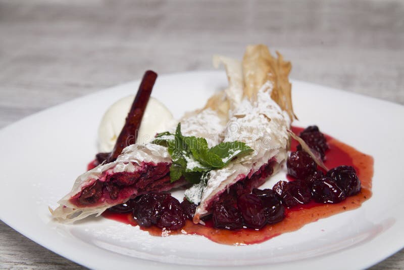 Puff pastry with cherry filling stock image Puff pastry with cherry filling stock image