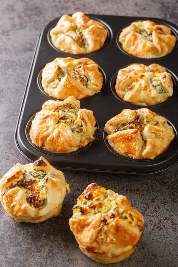 Puff Pastry Muffins Stuffed with Spinach and Feta Cheese Close-up in a