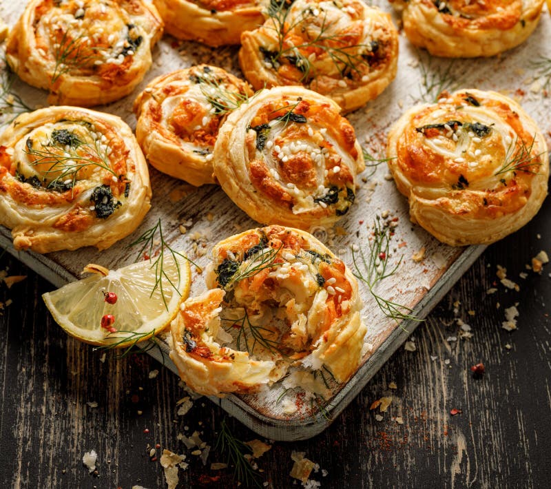 Puff Pastry Pinwheels Stuffed with Salmon, Cheese and Spinach in a Bowl