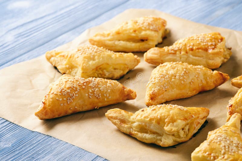 Puff pastry triangles filled with feta cheese and leek.