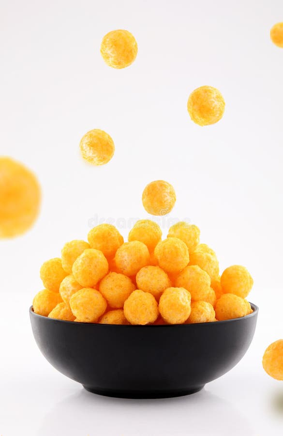 Puffed Ball Cheese Corn Chips in Gray Bowl on White Background Stock