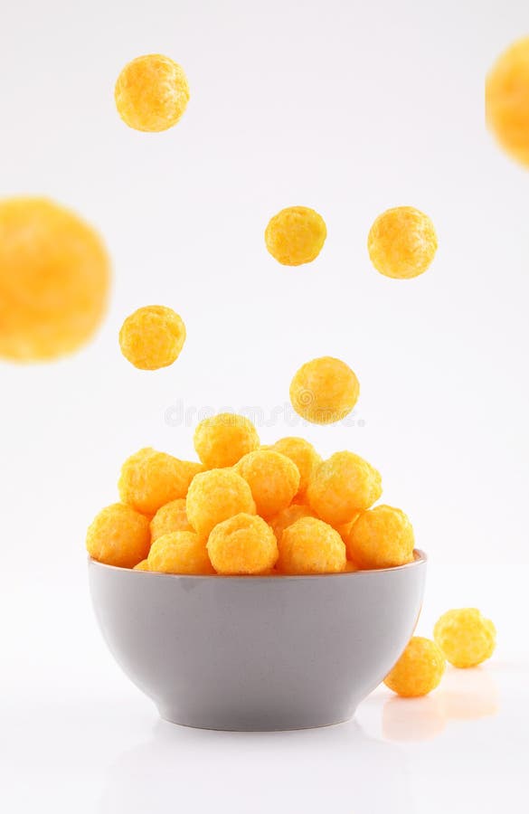 Puffed Ball Cheese Corn Chips in Gray Bowl on White Background Stock
