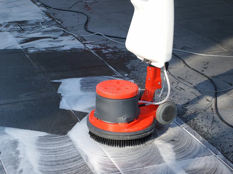 Floor cleaning with a machine. Floor cleaning with a machine.