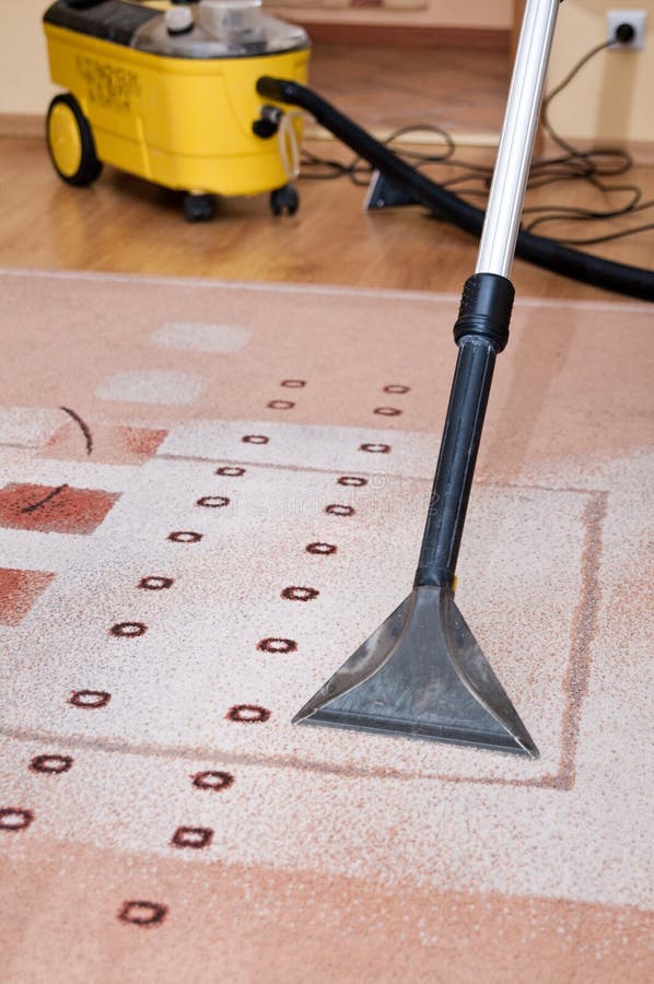 Professional carpet cleaning with the use of special vacuum cleaner. Professional carpet cleaning with the use of special vacuum cleaner.