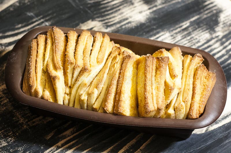 Pull-apart sweet bread. A loaf of layered pull-apart sweet cinnamon bread in a silicone pan stock image Pull-apart sweet bread. A loaf of layered pull-apart sweet cinnamon bread in a silicone pan stock image