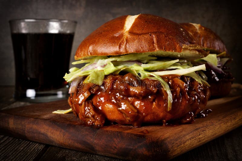 Pulled pork sandwiches close up on wood server royalty free stock photo