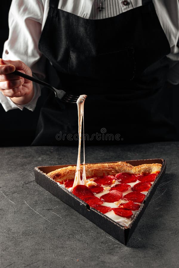 Pulling Cheese from Slice of Pepperoni Pizza Stock Image Image of