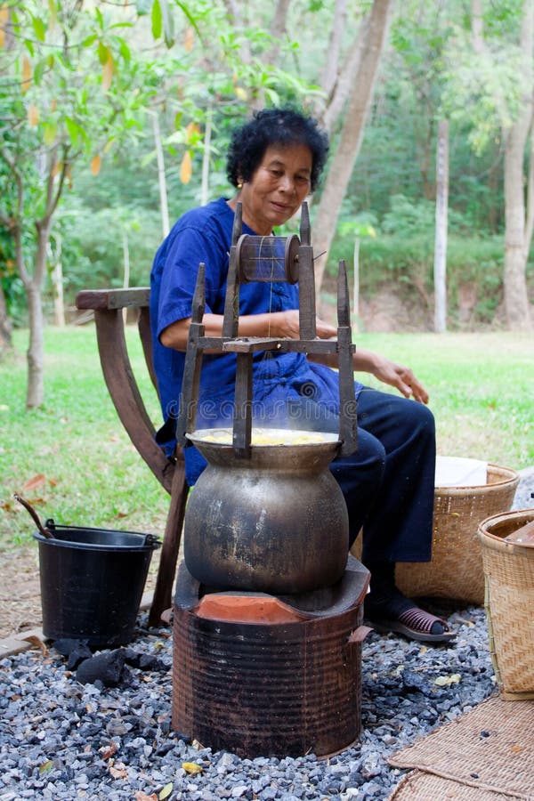 Pulling out silk thread stock photo. Image of thread 19380526