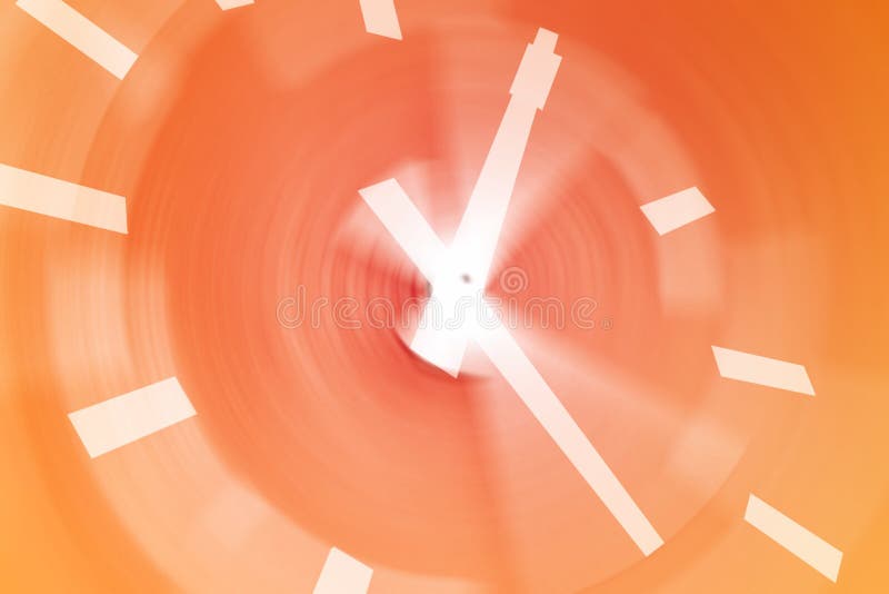 White busy clock with orange motion blur background. White busy clock with orange motion blur background