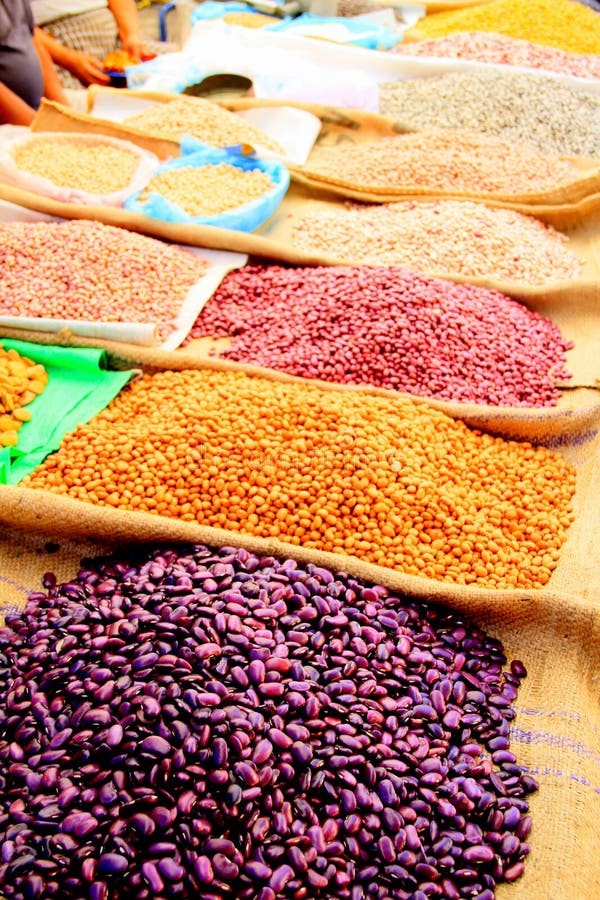 Pulses and Beans Displayed on Burlap Bags on Mexican Market Stall. Pulses and Beans Displayed on Burlap Bags on Mexican Market Stall