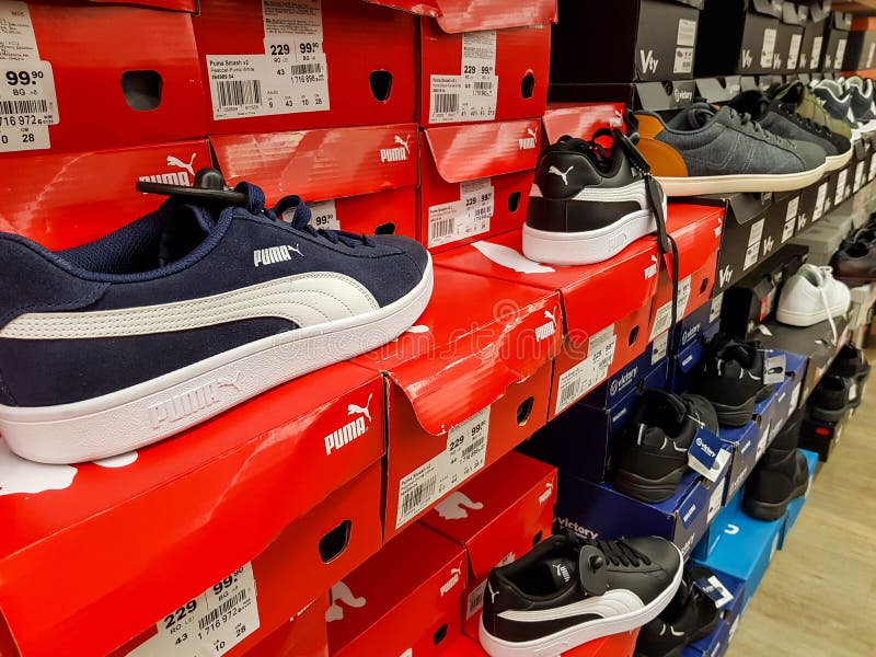 Puma Sport Shoes in Row Local Store. Editorial Photo - Image commercial, mall:
