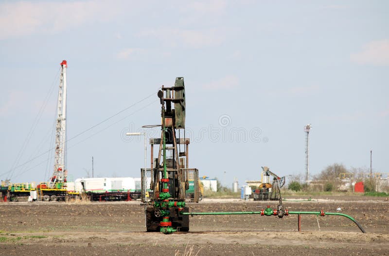 Pump Jack and Oil Drilling Rig Stock Image Image of petroleum