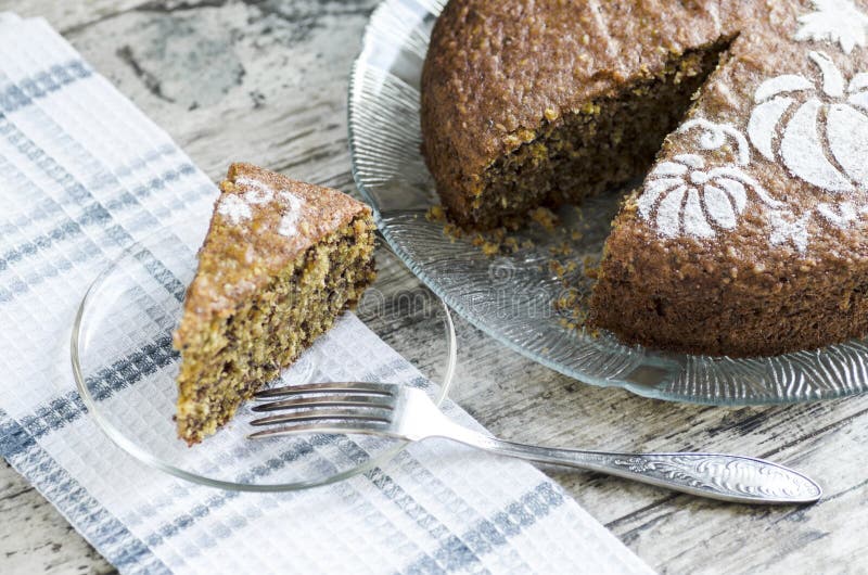 Pumpkin cake on glass plate and fork