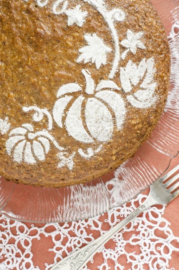 Pumpkin cake on red background