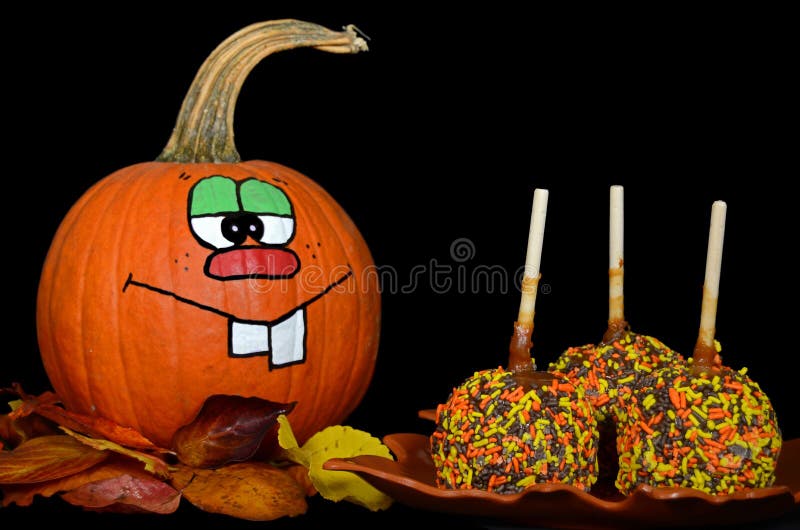 pumpkin with caramel apple stock photo