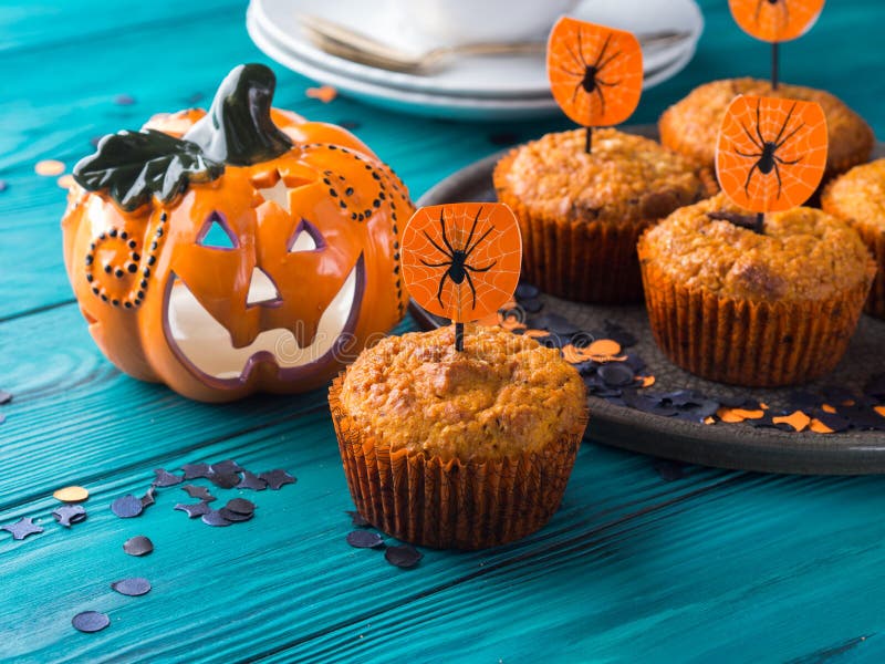 Pumpkin muffins for Halloween kids party.