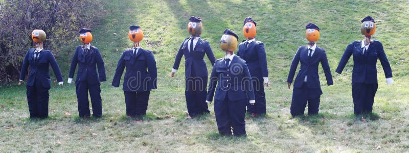 Pumpkin people - businessmen in suits