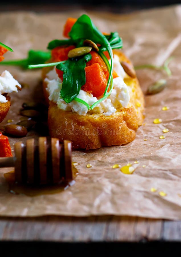 Pumpkin .ricotta, arugula bruschetta.selective focus stock photos Pumpkin .ricotta, arugula bruschetta.selective focus stock photos