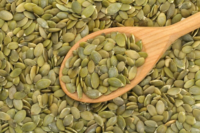 Pumpkin seeds with spoon