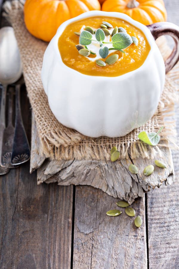 Pumpkin Soup with Cream, Herbs and Seeds Stock Image Image of green, meal 59692365