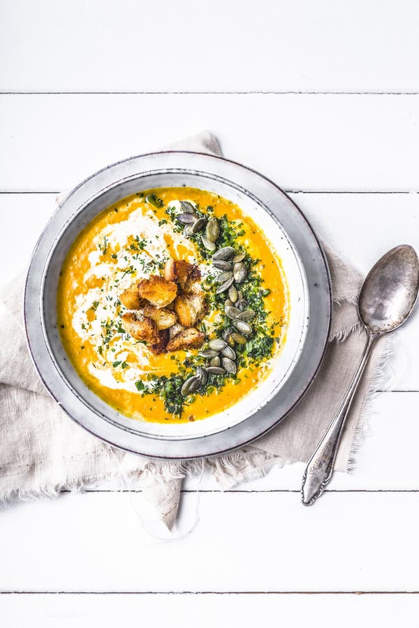 Pumpkin Soup with Cream,herbs and Seeds Stock Photo Image of