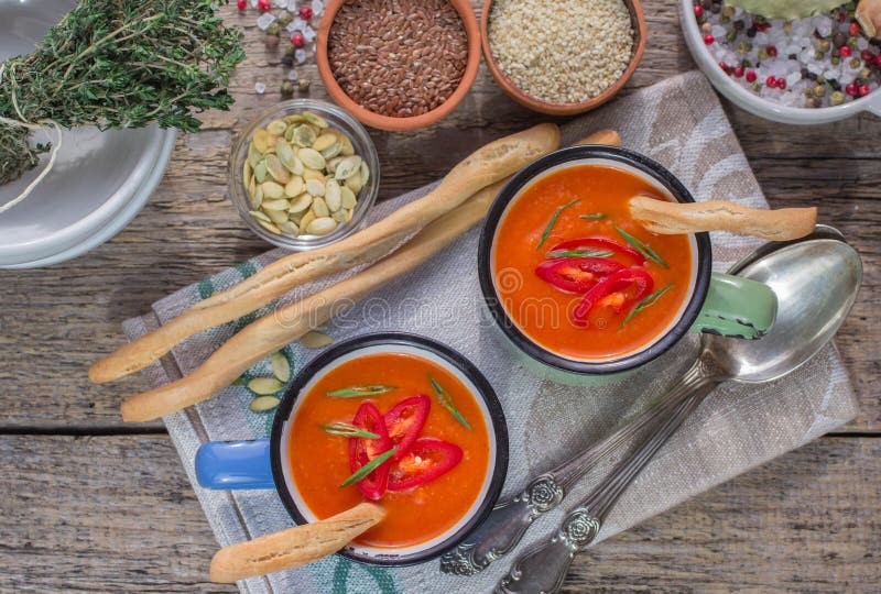 Pumpkin soup puree with hot pepper and herbs