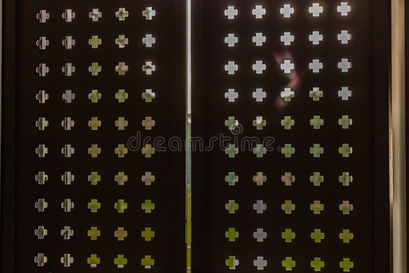 Punched iron door stock image. Image of grunge, fretted 110803411