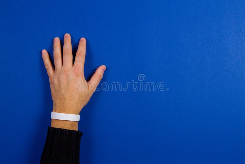 Mockup blank paper wristband, bracelet on man arm. Mockup blank paper wristband, bracelet on man arm