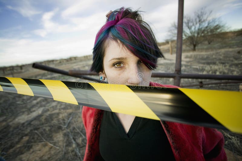 Punk Girl Behind Caution tape