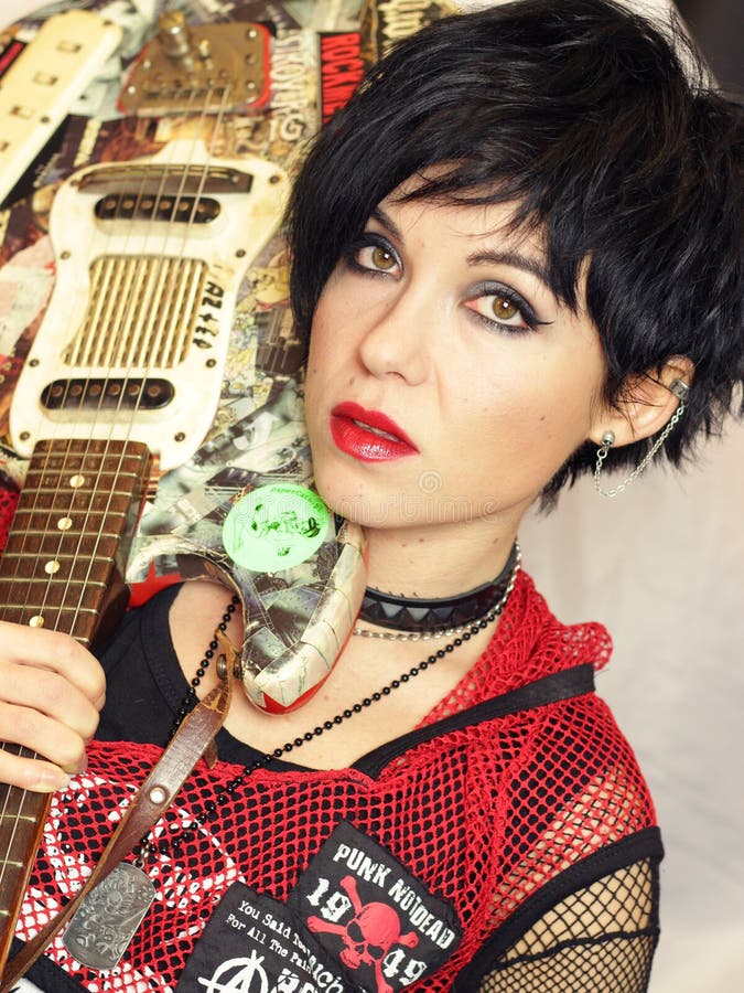 Punk girl with guitar stock photo. Image of dominatrix - 40951298