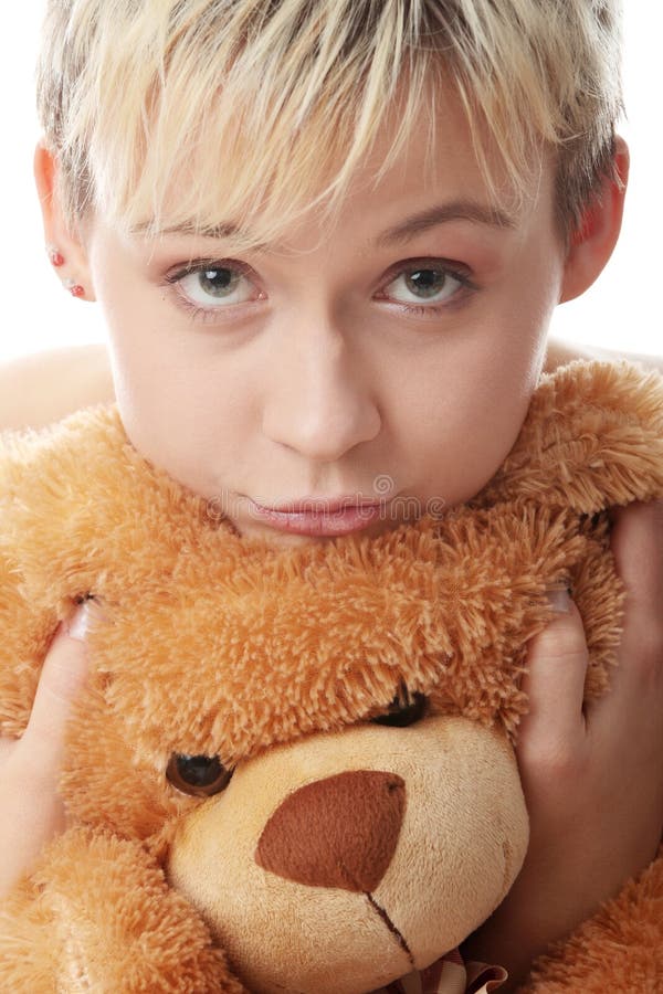 Punk teen girl with teddy bear