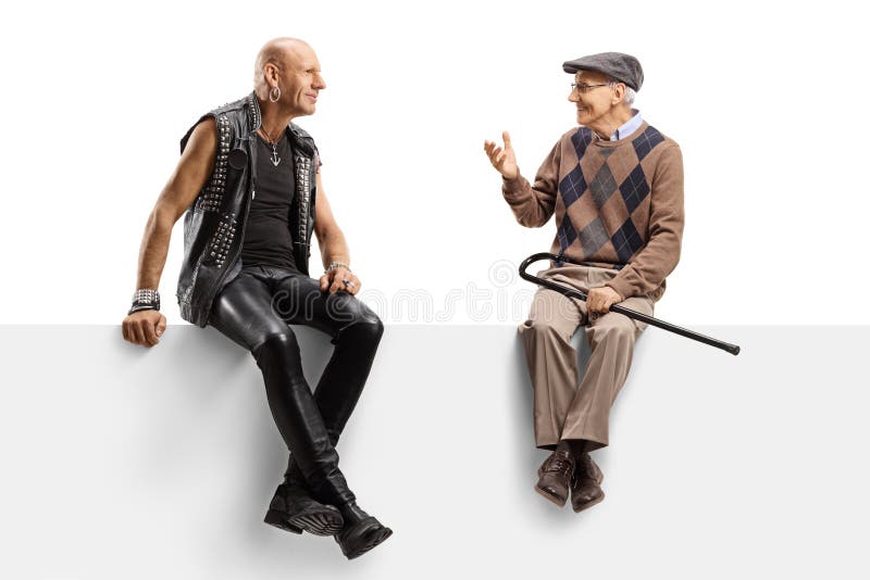 Full length shot of a punk and a senior men sitting on a panel and having a conversation isolated on white background. Full length shot of a punk and a senior men sitting on a panel and having a conversation isolated on white background