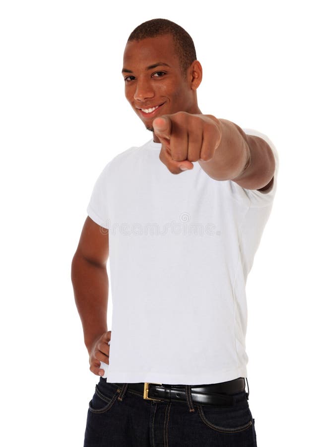 Attractive black guy points with finger. All on white background. Attractive black guy points with finger. All on white background.