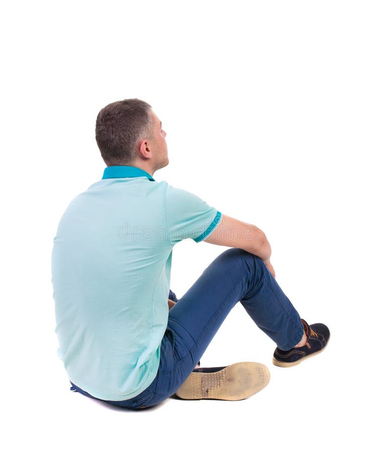 Back view of seated handsome man in polo looking up. Standing young guy in jeans. Rear view people collection. backside view of person. Isolated over white background. The guy in blue jeans and t-shirt sitting and looking at the sky. Back view of seated handsome man in polo looking up. Standing young guy in jeans. Rear view people collection. backside view of person. Isolated over white background. The guy in blue jeans and t-shirt sitting and looking at the sky.