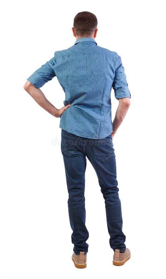 Back view of man in dark jeans. Standing young guy. Rear view people collection. backside view of person. Isolated over white background. Stylish man in a blue shirt is resting his arm in the side. Back view of man in dark jeans. Standing young guy. Rear view people collection. backside view of person. Isolated over white background. Stylish man in a blue shirt is resting his arm in the side