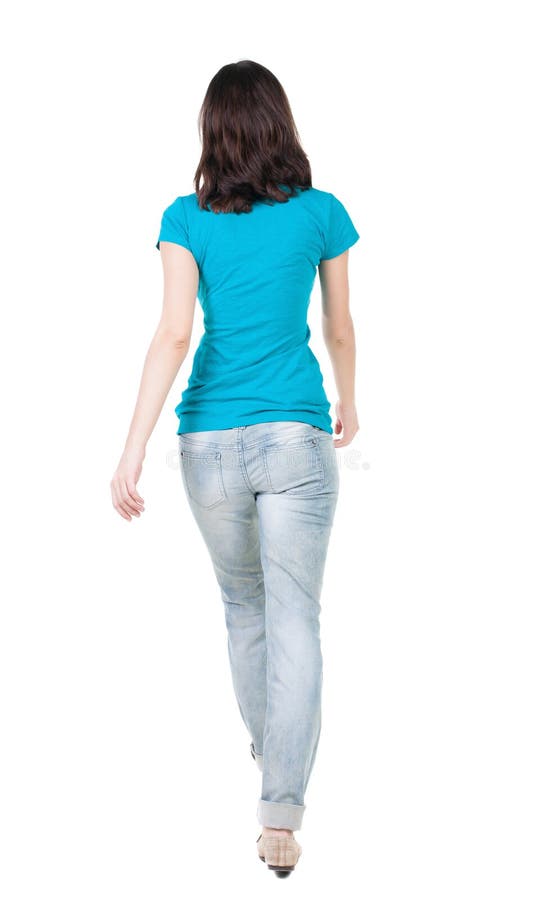 Punto di vista posteriore della donna di camminata in jeans fotografia stock libera da diritti