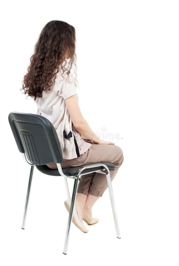 Back view of young beautiful woman sitting on chair. girl watching. Rear view people collection. backside view of person. Isolated over white background. Back view of young beautiful woman sitting on chair. girl watching. Rear view people collection. backside view of person. Isolated over white background.