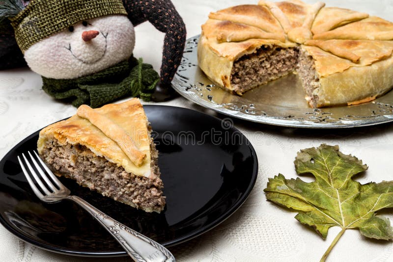 Tourtiere Canadian Meat Pie and snowman. Tourtiere Canadian Meat Pie and snowman