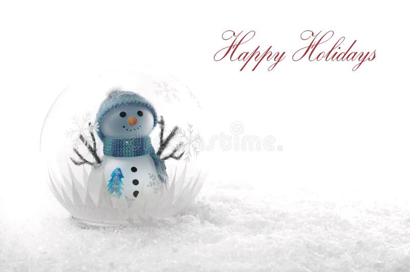 Pupazzo di neve di Natale in un globo fotografia stock libera da diritti Pupazzo di neve di Natale in un globo fotografia stock libera da diritti