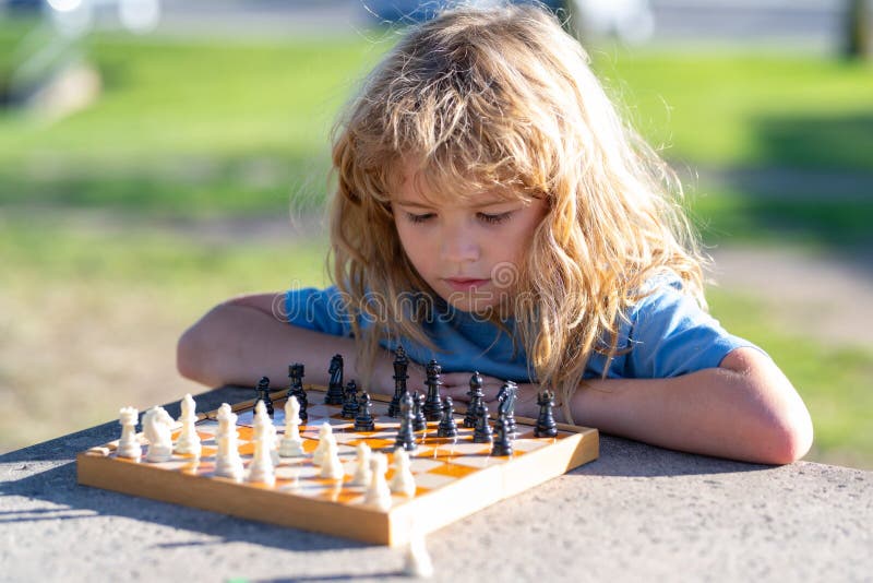 Kids Early Development. Pupil Kid Thinking about His Next Move in a Game of  Chess. Stock Image - Image of child, chess: 172839087