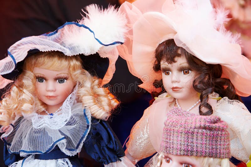 Two old-looking dolls for sales. Two old-looking dolls for sales