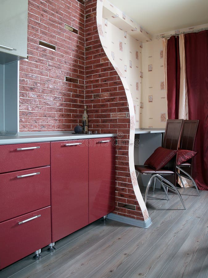 Pure Modern Red Kitchen with a Brick Wall Stock Photo Image of chair