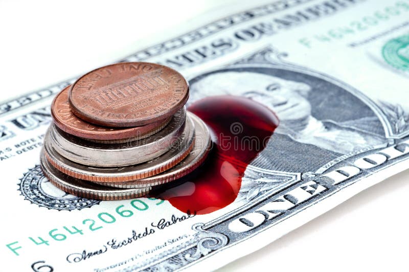 American change and a dollar bill bleeding from the recession. American change and a dollar bill bleeding from the recession
