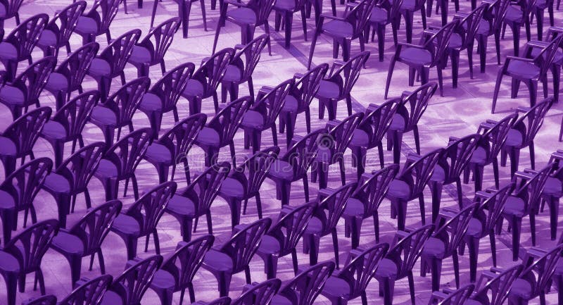 Purple chairs for audience.