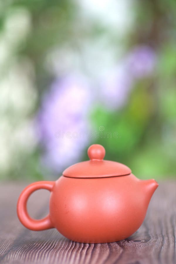 A purple clay milk pot royalty free stock image