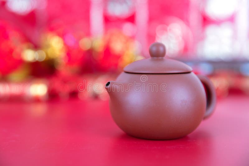 Purple clay milk pot on red background royalty free stock photos