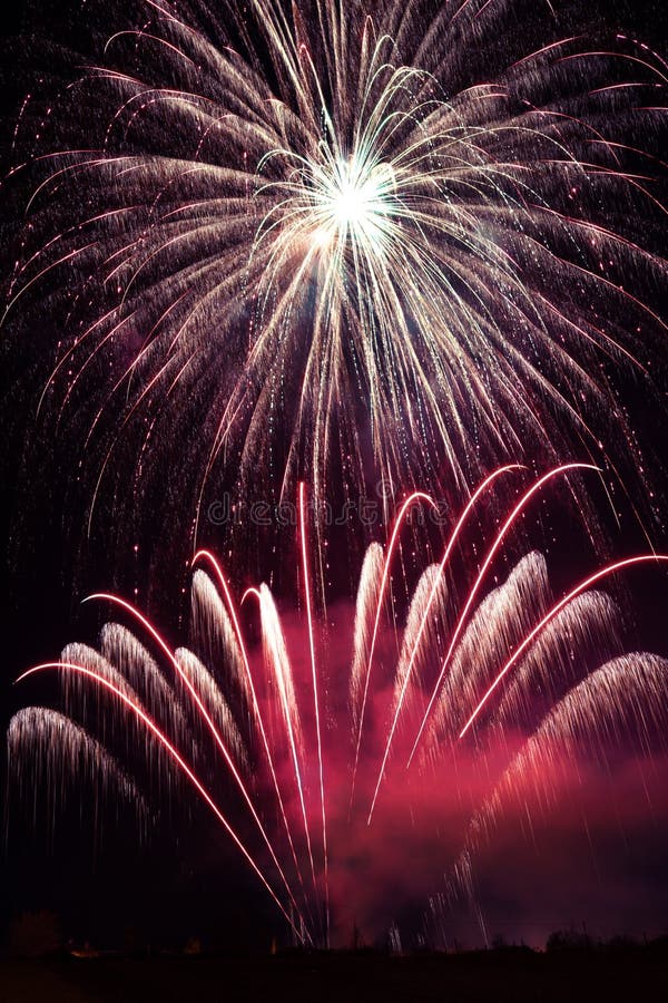 Purple fireworks display stock image